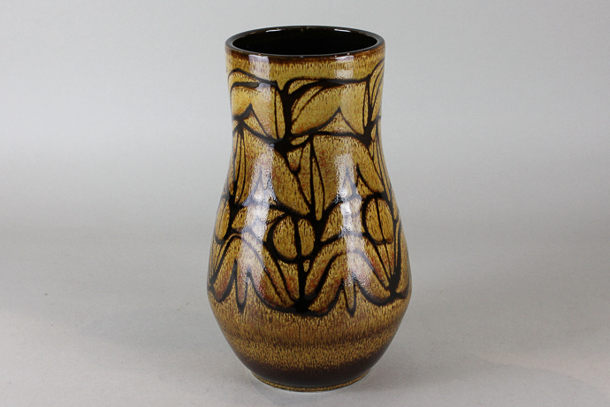 A Poole Pottery vase, Agean pattern with honey glaze and slip ware design, 23cm