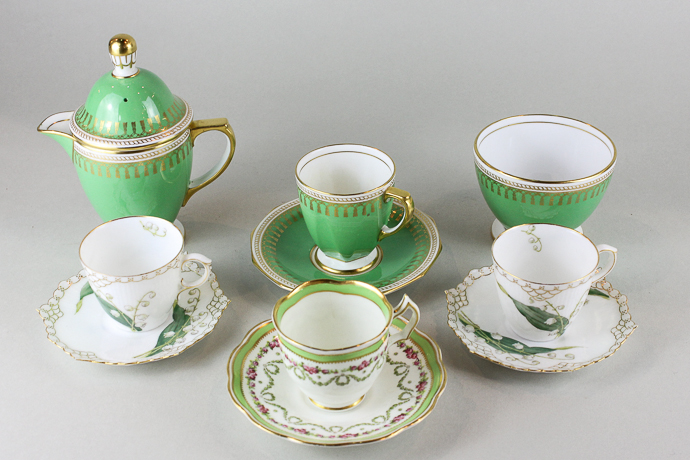 Six Danish `lily of the valley` decorated porcelain coffee cups and saucers, together with a Spode