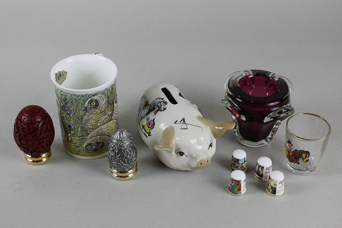 Six baby owl mugs, a collection of shot glasses, twelve collectors eggs and a the history of Britain