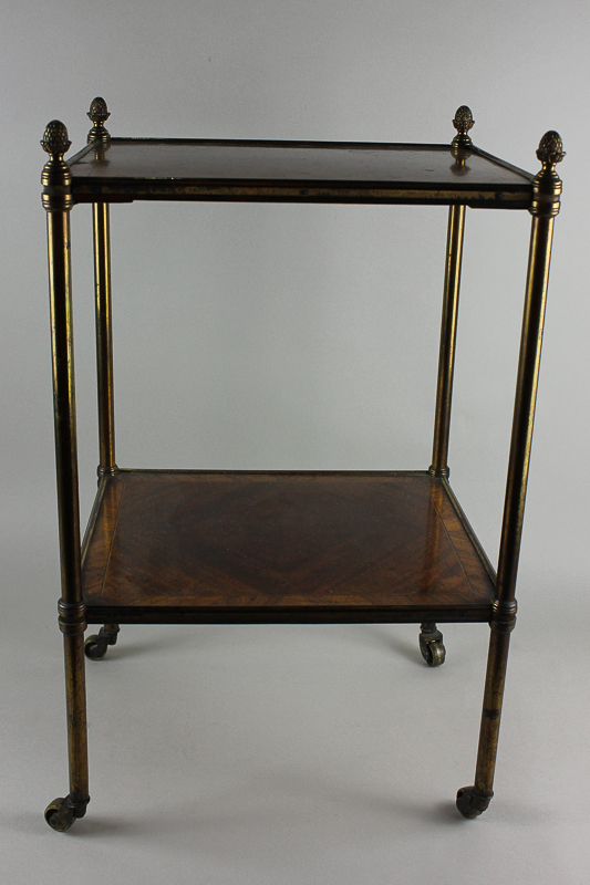 A small 19th century two-tier whatnot in French style with mahogany and kingwood banded tiers and