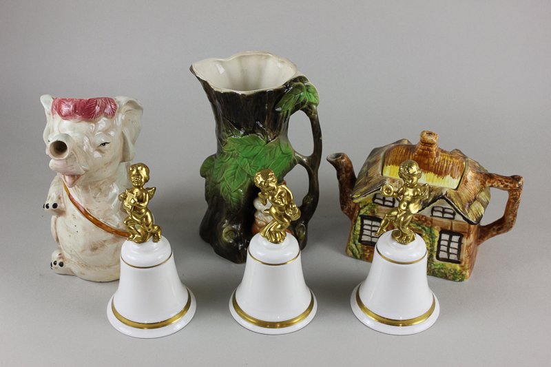 Three Royal Doulton "Glory" the Speech of Angels table bells with cherub musician handles together