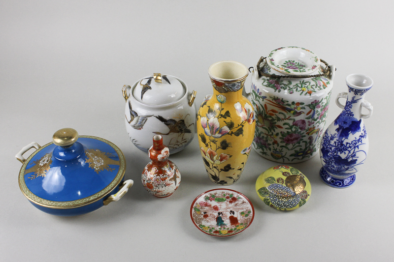 A collection of eight various oriental ceramic table items including a Chinese teapot, a Noritake