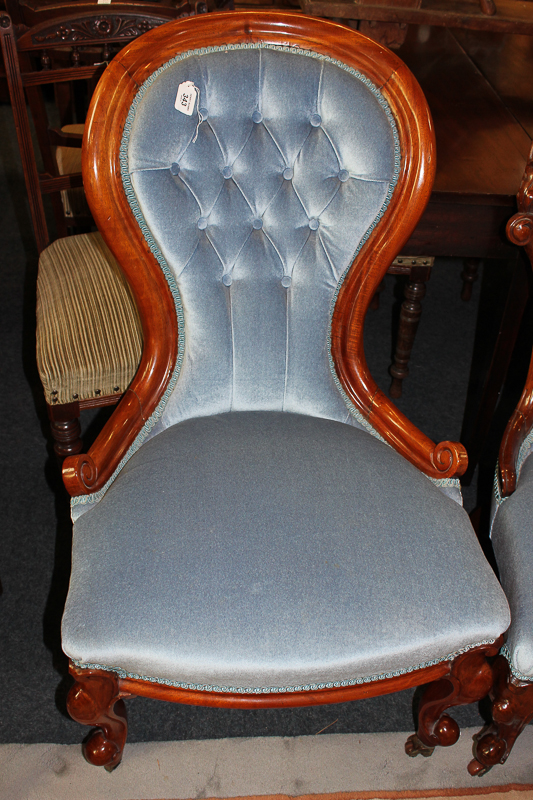 A Victorian mahogany framed crinoline chair with button back and seat in blue dralon on cabriole