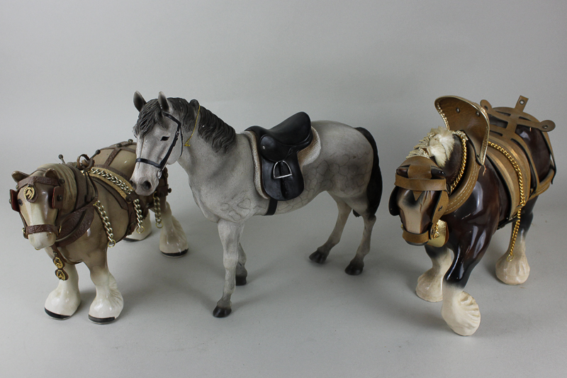 A boxed Leonardo saddled horse, together with seven various sizes of shire horses with harnesses,