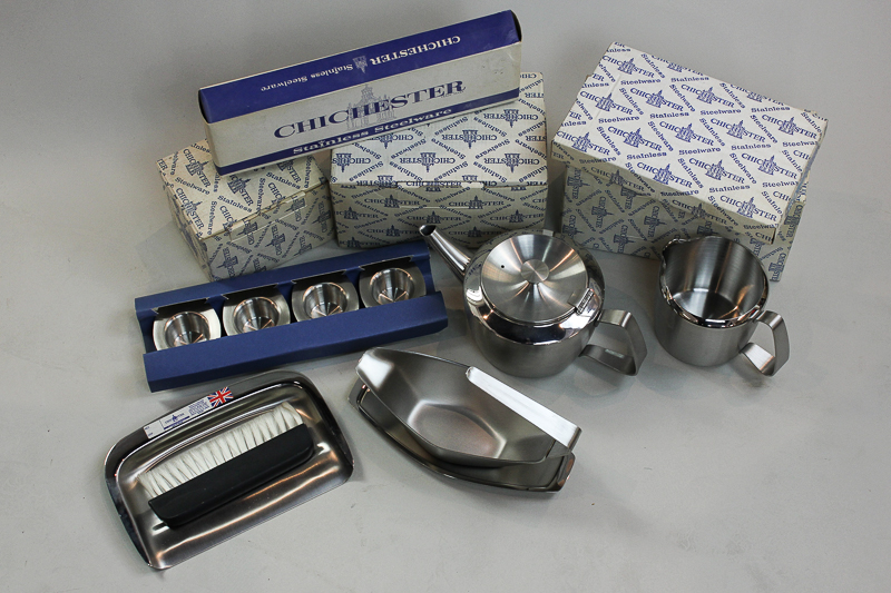 A collection of boxed stainless steel table/tea ware to include tea pot, two water jugs, oval dish