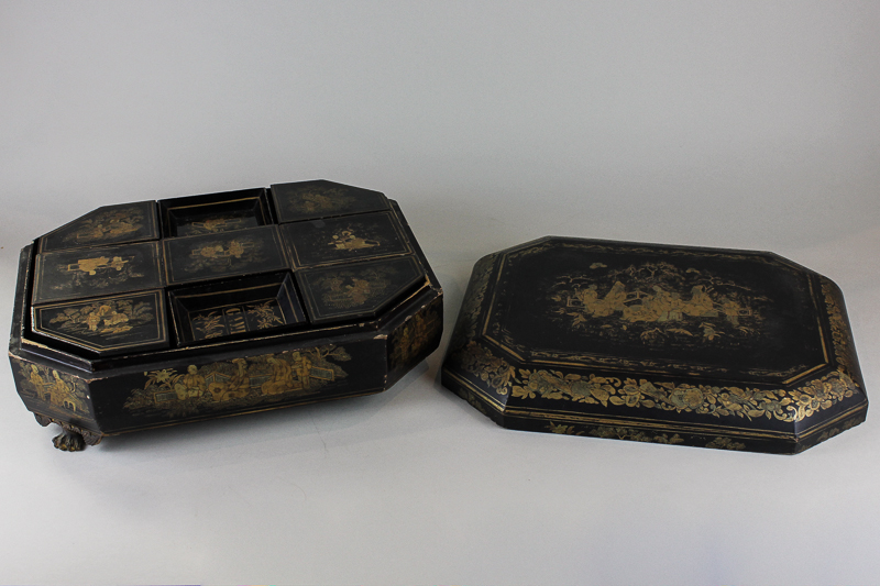 A 19th century Chinese black lacquered and chinoiserie decorated work box with lift off top