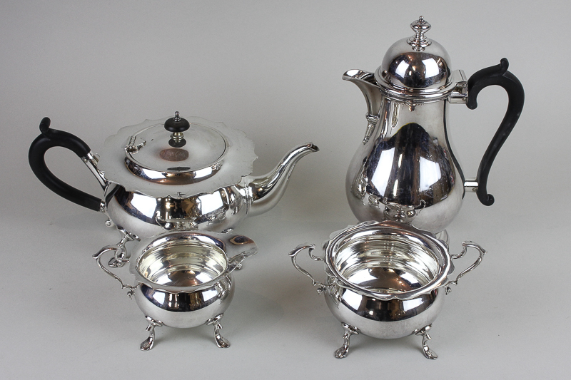 A three piece Mappin & Webb plated tea set with waved edges comprising tea pot, sugar bowl and cream