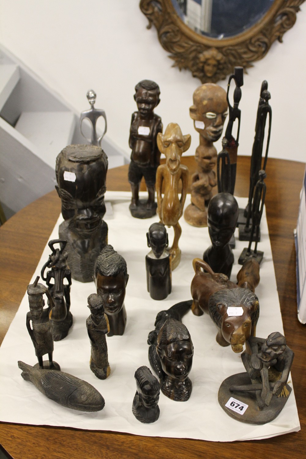 Ethnic Treen Art: African carved hard and soft wood full figures and busts, some stylised