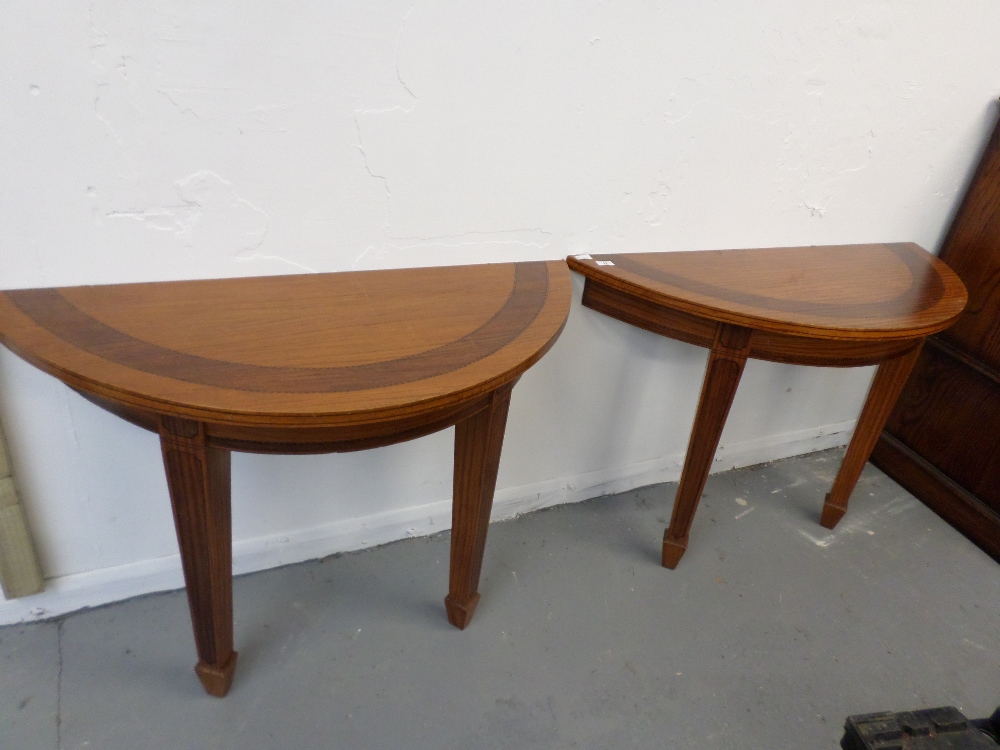 Pair of demi lune tables