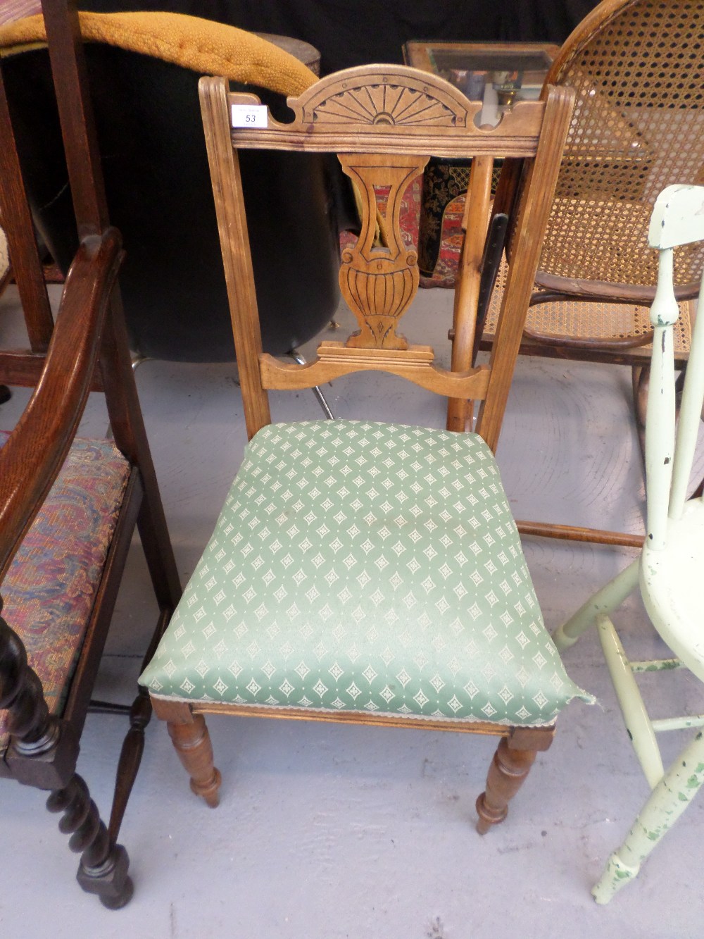 Edwardian chair with green cover