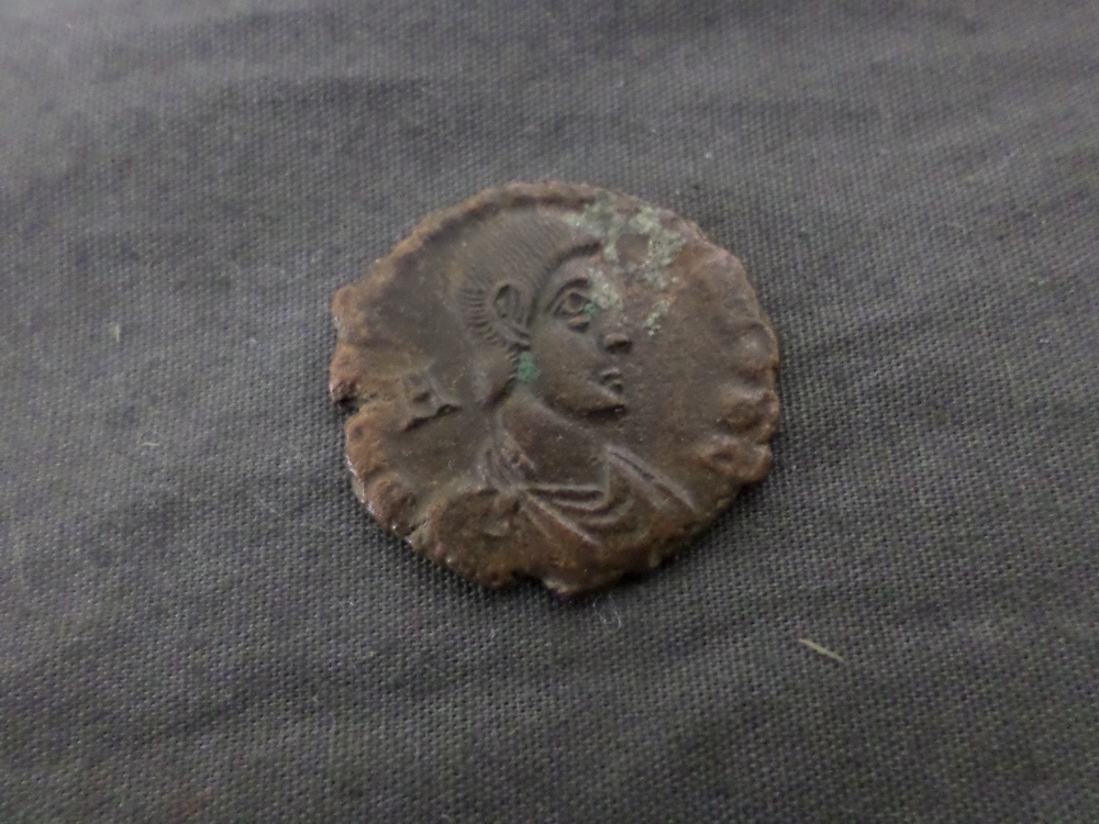 Constantius II Roman bronze ae3 coin. A.D. 337-361. Reverse soldier advancing spearing a fallen