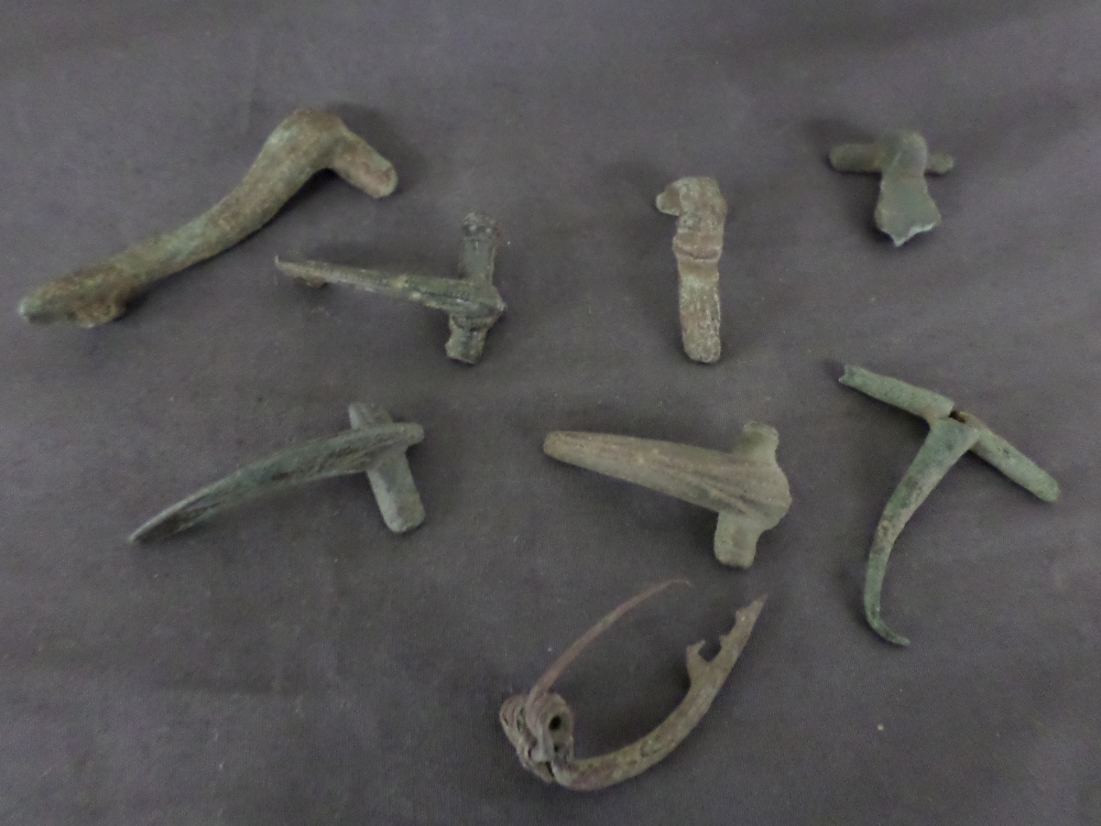 Collection of eight Celtic and Roman bronze brooches. 1st-3rd century A.D. Largest 55mm. (8)