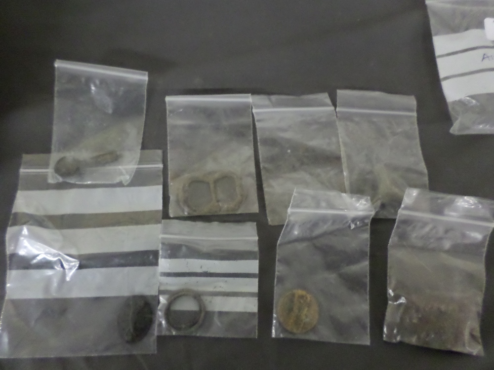 Lot of metal detecting finds including buckles, spur terminal, early gilded button. Medieval-