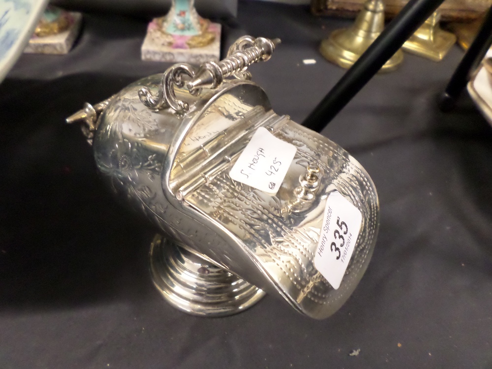 Plated salt in the shape of a coal scuttle