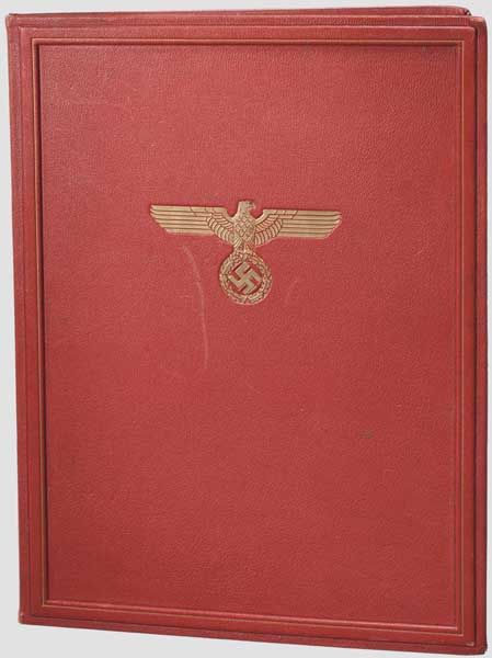 A presentation folder for documents  Red folder made of fine Morocco leather, with gold-embossed