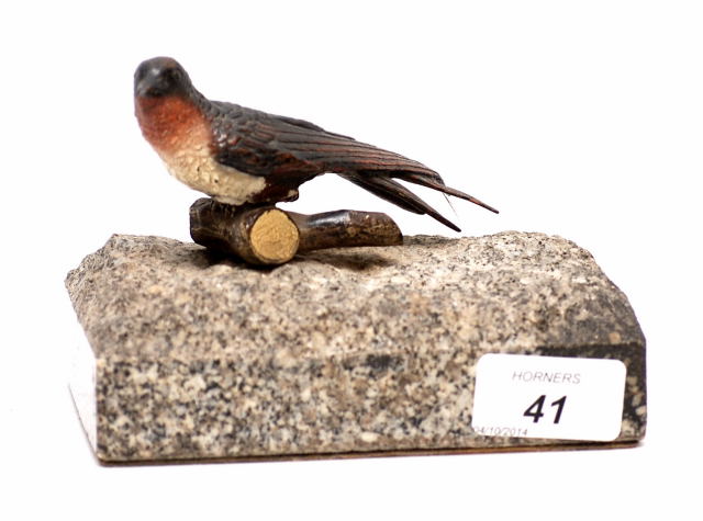 A BRONZE COLD PAINTED FIGURE OF A BIRD ON A GRANITE BASE PERHAPS AUSTRIAN