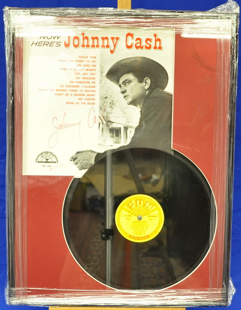 JOHNNY CASH SIGNED SUN STUDIOS RECORD - MOUNTED AND FRAMED (FRAME 61 X 46 CM APPROX)