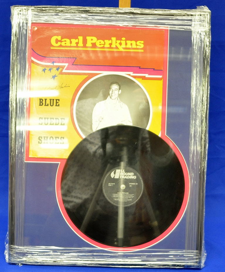 CARL PERKINS SIGNED BLUE SUEDE SHOES RECORD - MOUNTED AND FRAMED (FRAME 63 X 47 CM APPROX)