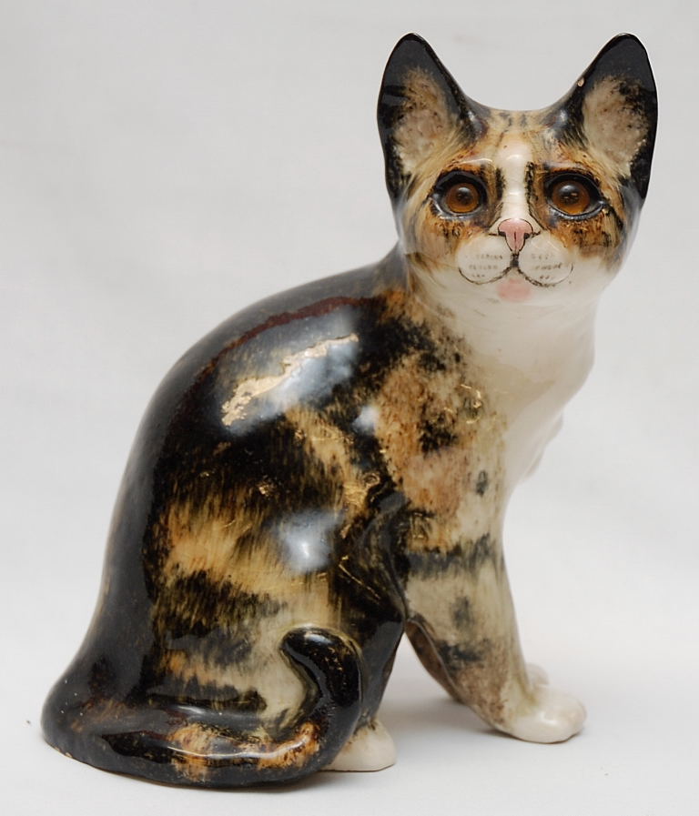 A WINSTANLEY CAT, HEIGHT 25CM