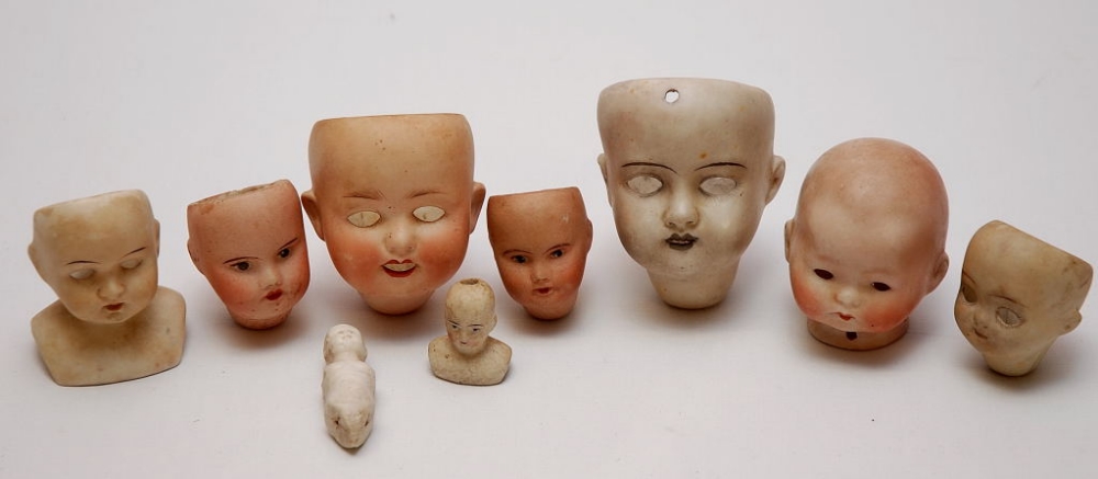 COLLECTION OF DOLLS HEADS