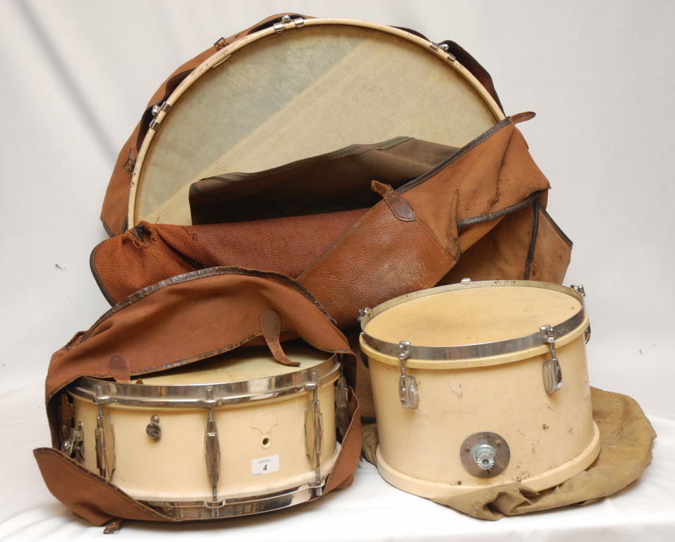 A JOHN GREY SNARE DRUM AND A PREMIER BASS DRUM IN IVORY FINISH IN CANVAS SOFT CASES
