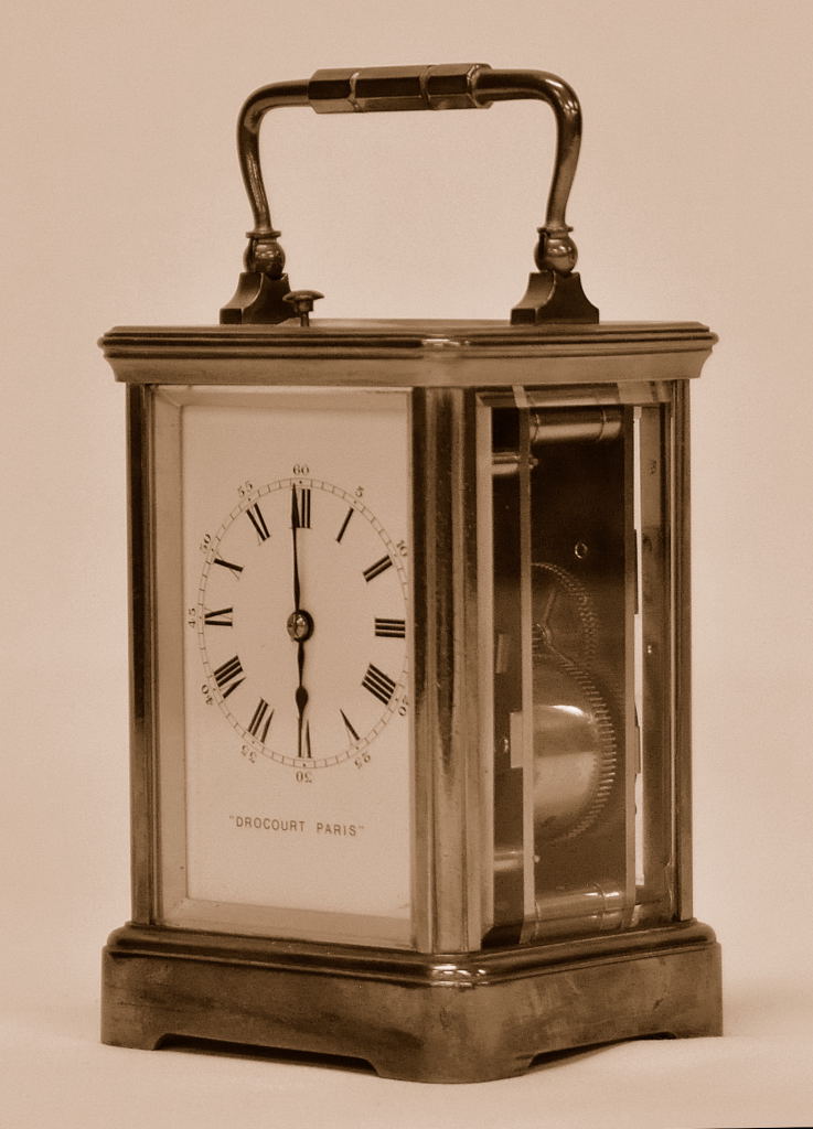 A FRENCH BRASS CARRIAGE CLOCK WITH THE REPEAT