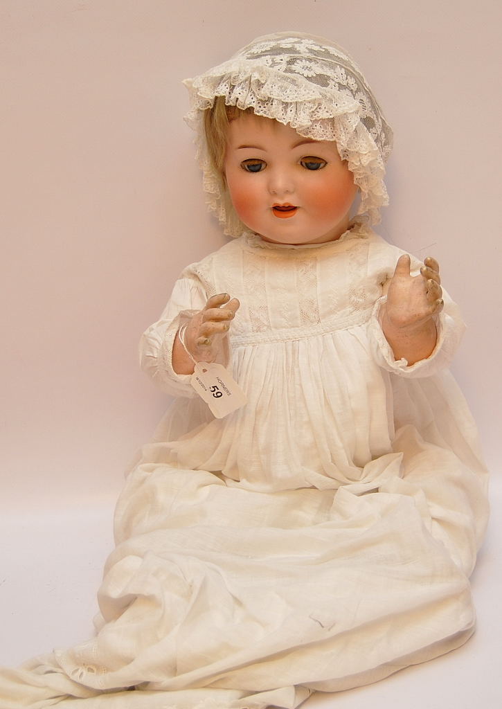 A KAMMER AND REINHARDT NO. 22 GERMAN DOLL WITH PORCELAIN HEAD, OPEN/SHUT EYES, OPEN MOUTH, COMPOSITE