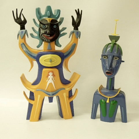 TWO CONTEMPORARY PAINTED FIGURES IN AFRICAN STYLE APPROX 50CM BY THE LATE JOHN BEAVEN