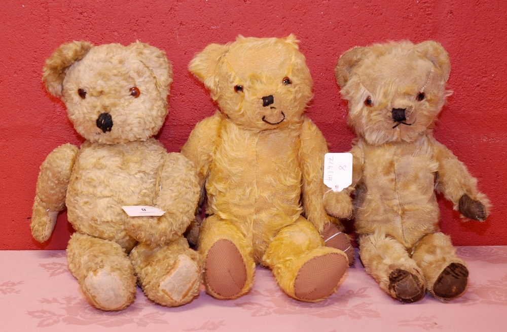 THREE PLAY WORN VINTAGE BEARS JOINTED WITH AMBER/BLACK BUTTON EYES, 36CM APPROX.