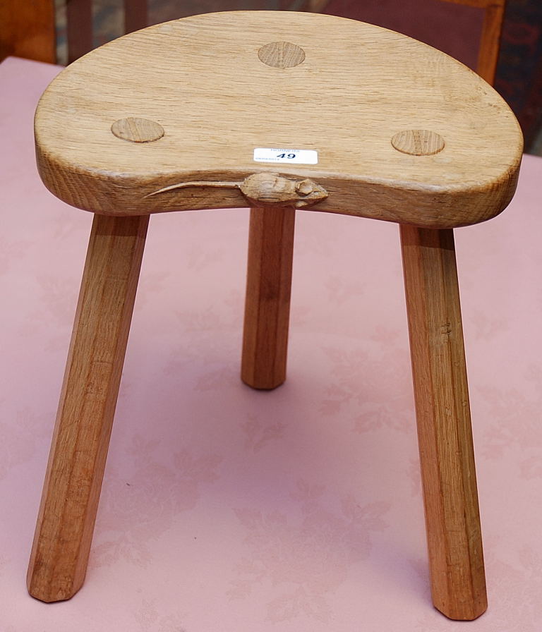 AN OAK HANDMADE 3 LEGGED MILKING STOOL WITH SMALL MOUSE CARVED TO FRONT, BELIEVED TO HAVE BEEN