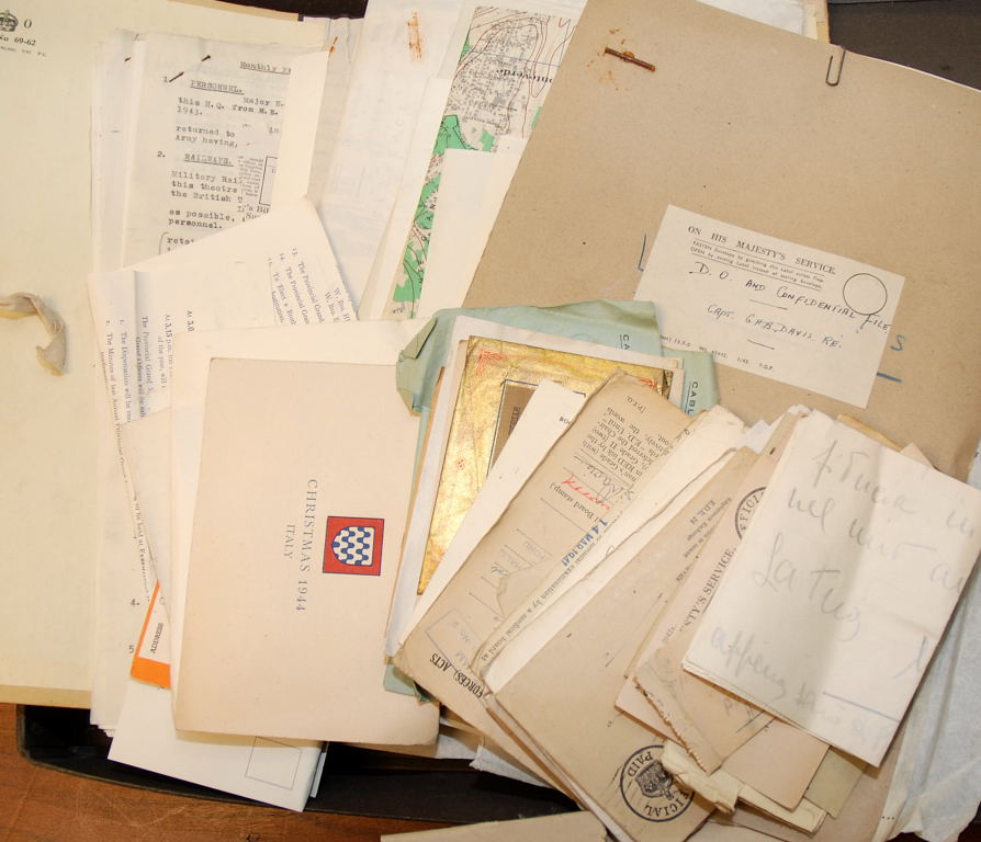 BOX WITH WWII EPHEMERA, FOLDER OF MILITARY ORDERS, RELATING TO CAPT. DAVIS, TRANSPORTATION