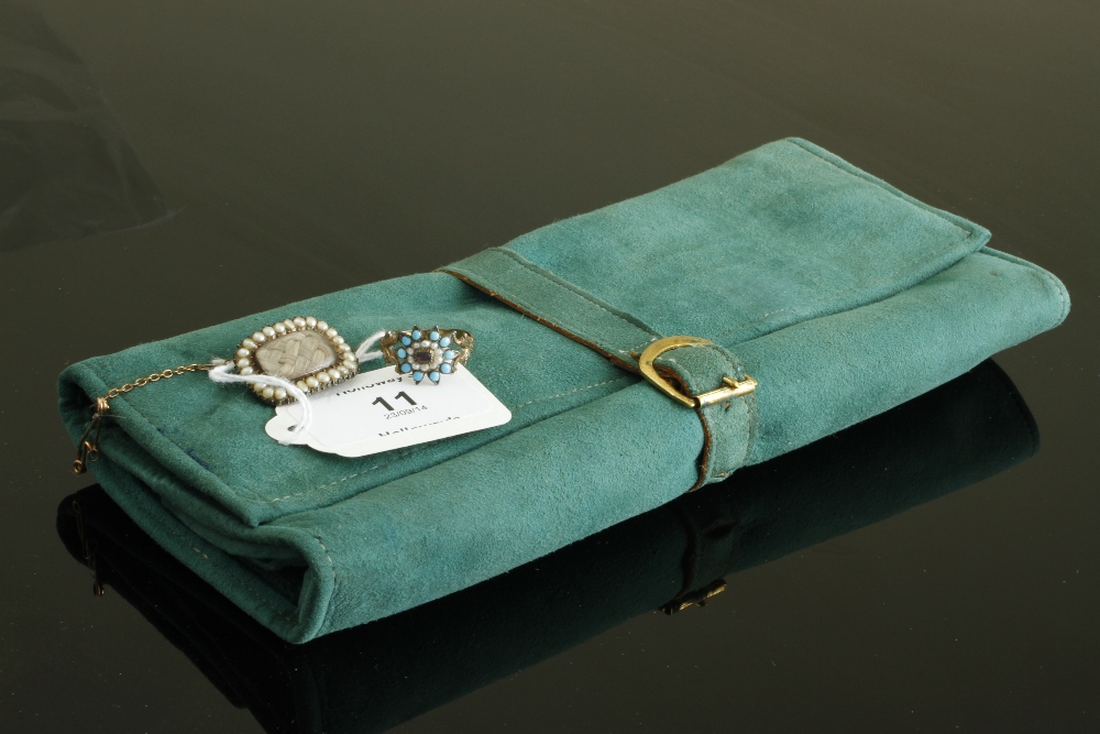 A mid 19th century mourning brooch, rounded rectangular with split pearl border and glazed hair