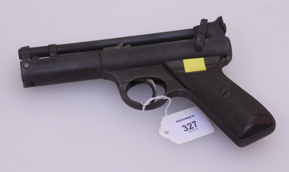 A Webley `Senior` 177 calibre air pistol, No. C16937, dated 1925, the slanted pistol grip with two