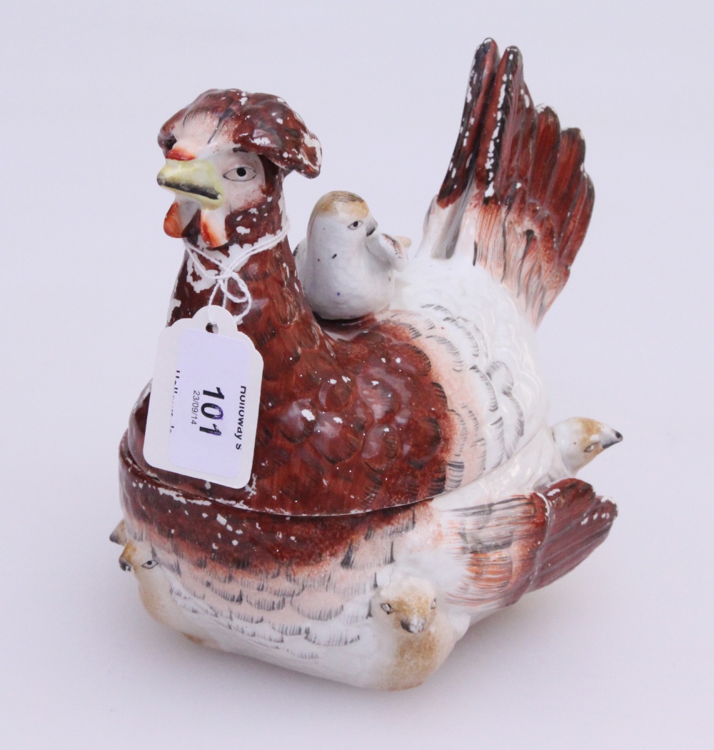 A late Victorian pottery egg crock, considered to be an Appenzeller Hobenfitzer breed, with chicks