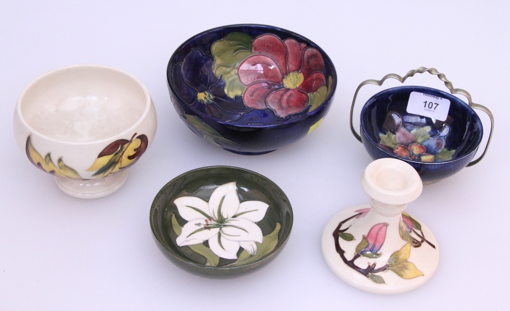 A small collection of Moorcroft, includes a clematis pattern bowl on a blue ground, 16 cm (6 1/4