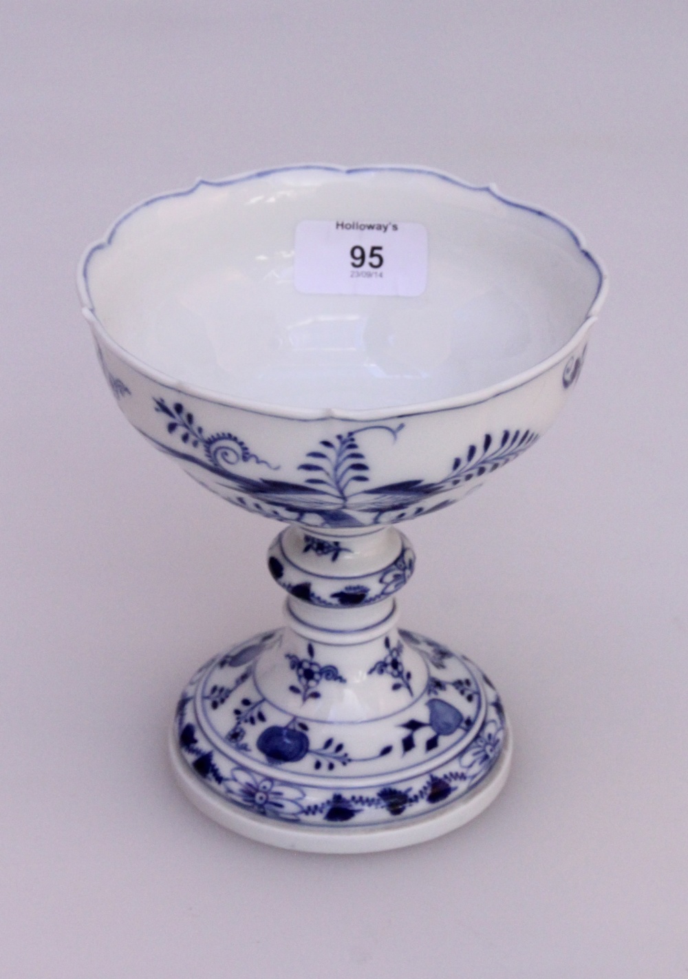 A late 19th century Meissen blue and white `onion` pattern pedestal sweet meat comport, with