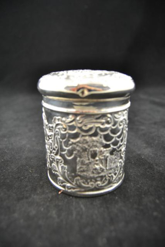 An embossed silver pot and cover with figure design to body - Birmingham 1900, maker Levi &