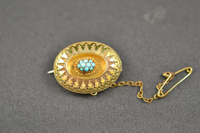 A Victorian yellow metal memorium brooch set with turquoise   CONDITION REPORT:  good condition, pin