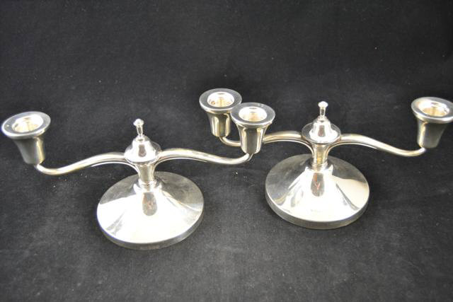 A near pair of mid 20th century Walker & Hall silver two branch candlesticks, Sheffield 1960/62 -