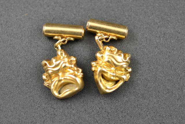 A pair of 9ct gold 'comedy & tragedy' cuff links - approx weight 16.4g