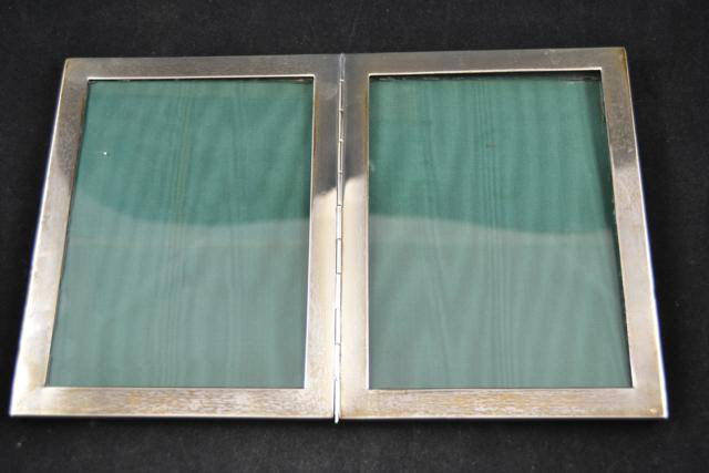 A silver folding double photo frame, London 1908 - 20.5x31cm