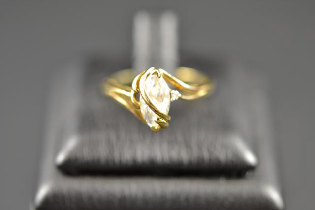 A 9ct gold ring set with cubic zirconia, size N - approx gross weight 2.3g