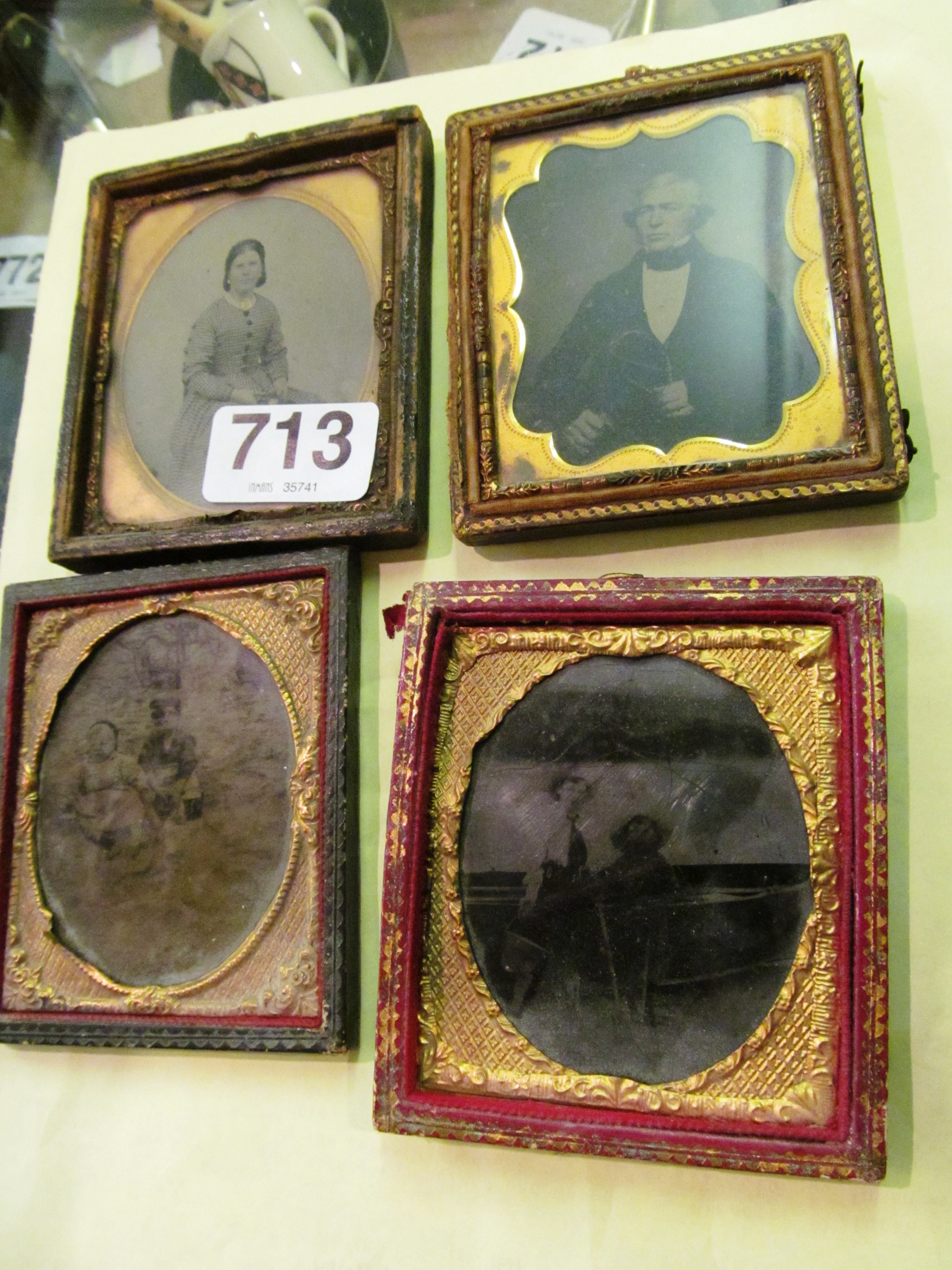 Two Victorian daguerreotypes children and two framed photographs Victorian lady and gentleman