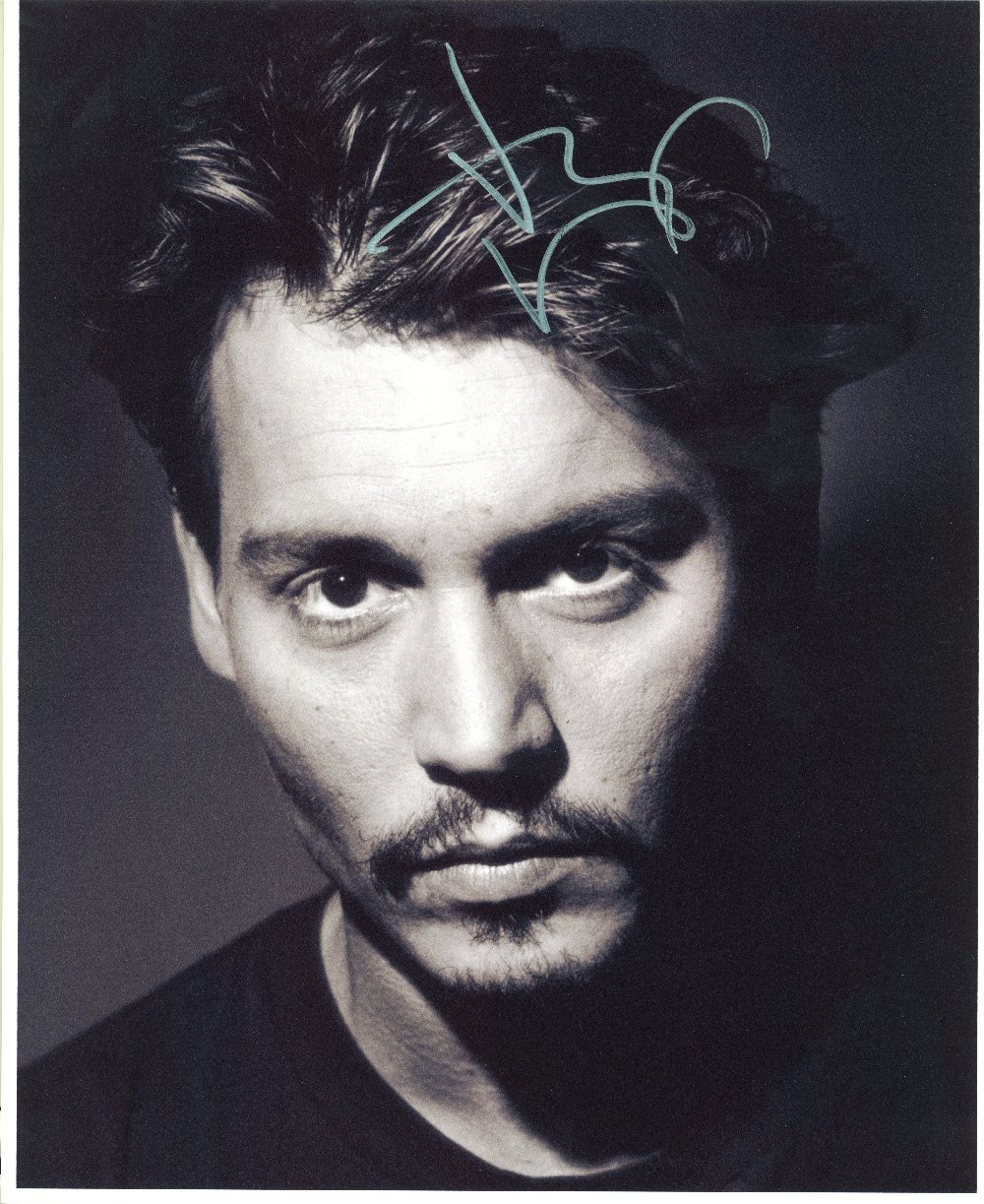 DEPP JOHNNY: (1963-  ) American Actor. Signed 8 x 10 photograph showing the actor in close-up