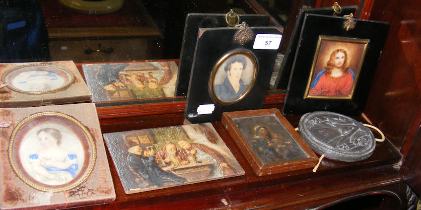 A collection of five assorted miniature religious and other portrait paintings and a reproduction “