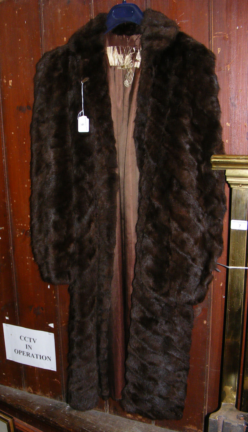 A lady’s full length fur coat.