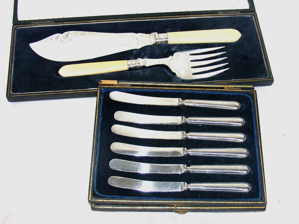 A cased set of fish servers with sterling silver ferrules & bone handles, along with a cased set