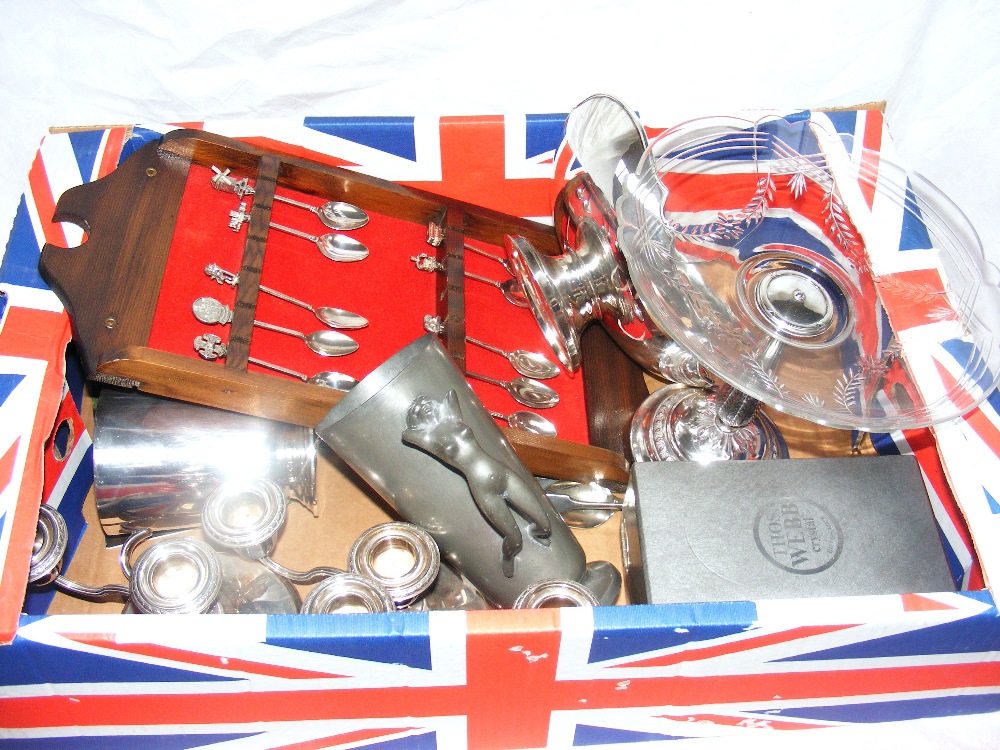A box of metal wares including a pewter tankard with a nude lady handle, a glass & silver plated