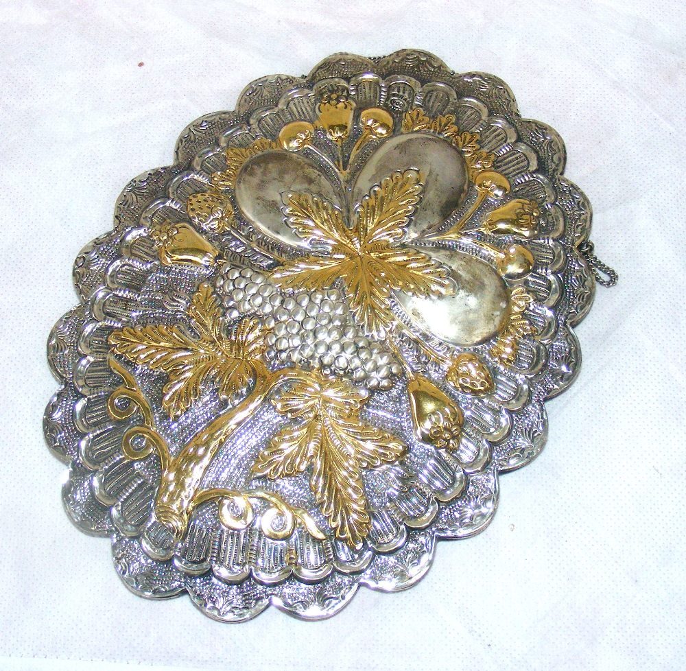 A sterling silver & gilt mirror cast with leaves & fruit decoration stamped indistinctly "Orham 900" - Image 2 of 2