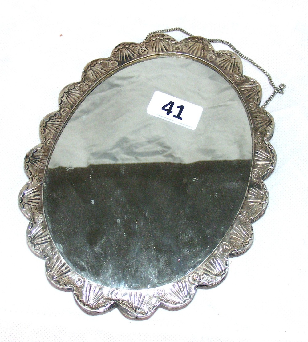 A sterling silver & gilt mirror cast with leaves & fruit decoration stamped indistinctly "Orham 900"